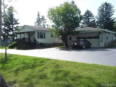 Exterior Back 2 car garage being used as work shop