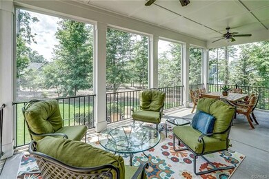 Large screened in porch which looks over common wo