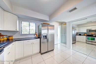 kitchen open to foyer