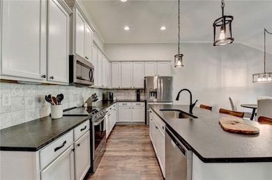 Kitchen with appliances with stainless steel finis