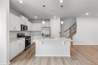 1006 Poets Walk Rd, Whitsett, NC 27377 - photo 6