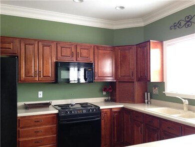 Functional kitchen with plenty of storage space and large pantry.