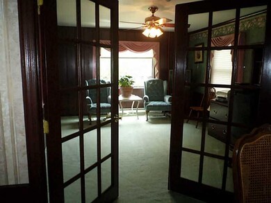 Den. Gracious French doors