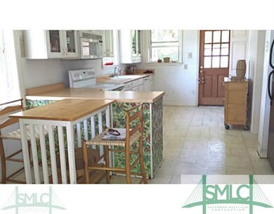 Kitchen. Nice big kitchen area with Backdoor leadi