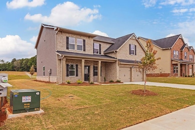 View of front of property with a front yard and a 