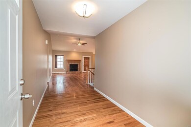 Wood Floors Entry Foyer and Neutral Paint Througho
