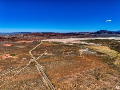 Aerial view of sparsely populated area featuring a mountain backdrop