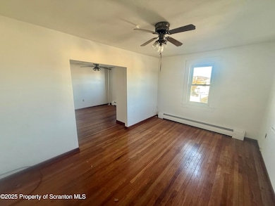 662 Simpson St, Throop, PA 18512 - photo 2