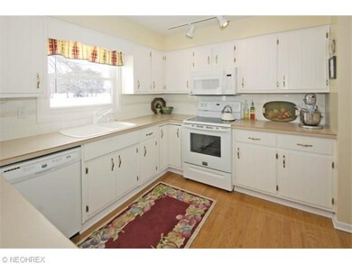 The light, bright kitchen........note the floors!