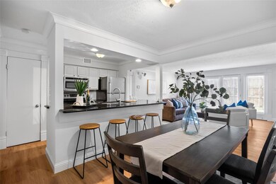 Dining area with light wood finished floors, visib