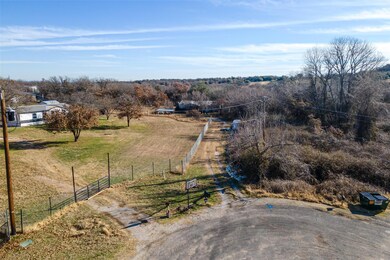 Birds eye view of property with a rural view