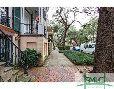 View. The cobblestone sidewalk invites you to be a