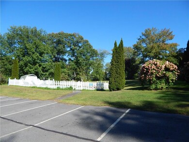 Parking lot view of pool