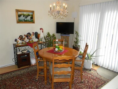 Spacious breakfast room with door to large 20x9 de