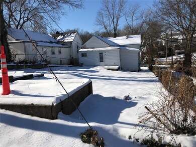 Back yard with off alley parking and rear entrance