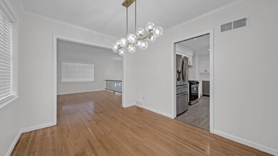 Unfurnished dining area featuring a notable chande