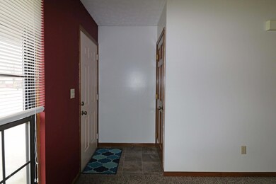 Foyer area with closet