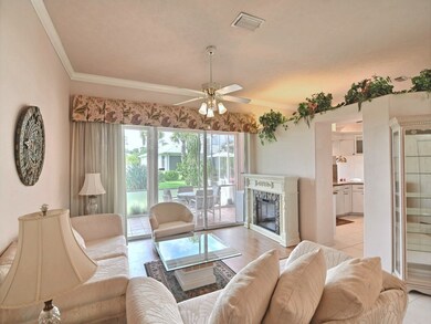 Living room with view of screened patio