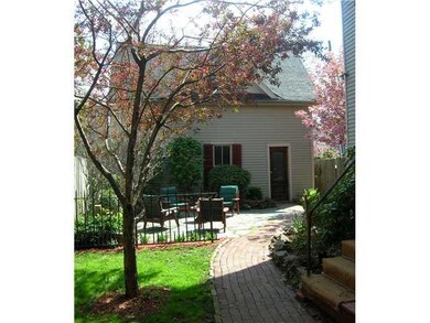 Exterior Back Charming brick path leads to carriag