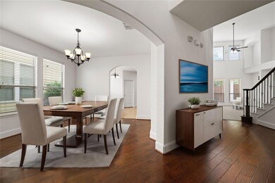 Dining space featuring dark wood-type flooring and