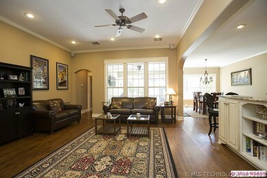 Open floor plan; hardwoods, crown moldings...