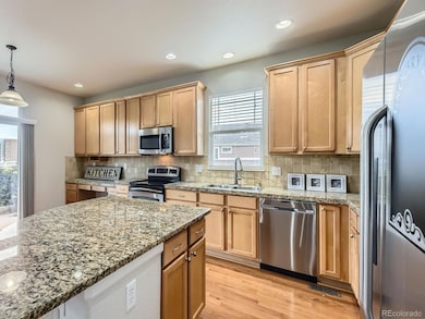 581 N Flat Rock Cir, Aurora, CO 80018 - photo 3