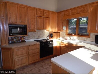 Lots of cabinets and counter top space for prepari