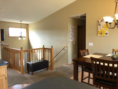 View from kitchen looking towards entry and hall t