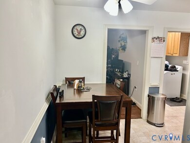 Dining space with ceiling fan and washer / clothes dryer
