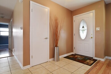 Beautiful front door welcomes you in with a spacio