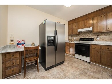 Kitchen with new vinyl tile flooring, countertop, 