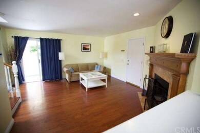 Family room includes wood burning fireplace
