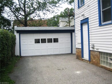 Ex-large cement block garage.