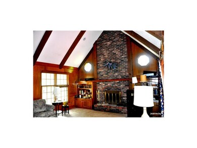 Fireplace:  floor to ceil brick fireplace / twin c