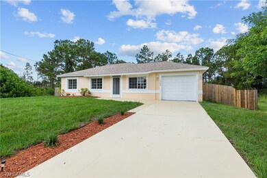 1206 Jaguar Blvd, Lehigh Acres, FL 33974 - photo 2