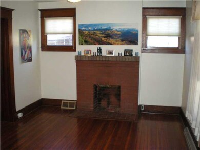 Living Room. Living room with original hardwood fl