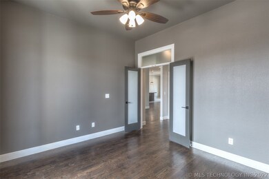 Breathtaking transom window over double doors to d