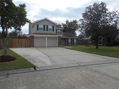 Extra WIDE driveway.  The double gates open to an