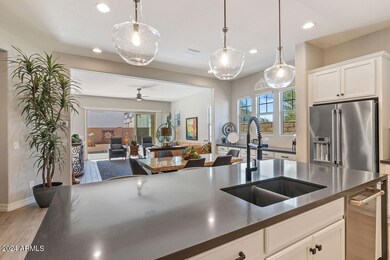 Kitchen view extending to backyard