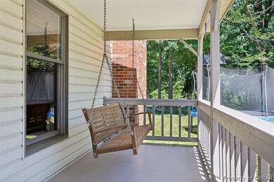 Balcony featuring a wrap around porch