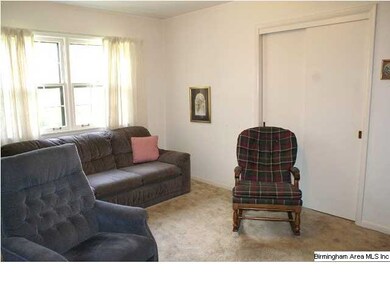 3rd bedroom currently being used as a den with a f