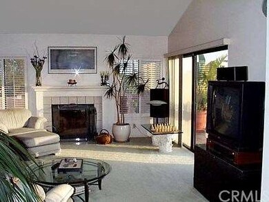 Large living room with soaring vaulted ceilings. T