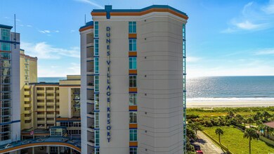 View of building exterior featuring a water view a