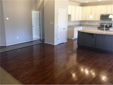 Open Concept, hardwood floors , 9ft ceilings all h
