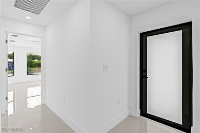 Hall with visible vents, recessed lighting, basebo