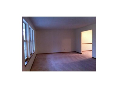 Living room to formal dining.