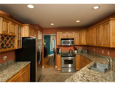 Kitchen. The kitchen offers ample...