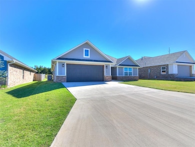 Craftsman-style home featuring a garage and a fron