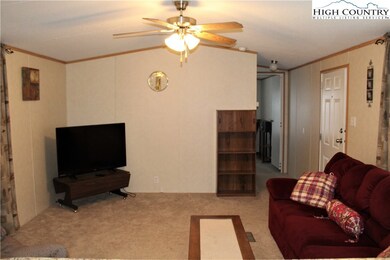 Front door on the right, main bath and guest bedro