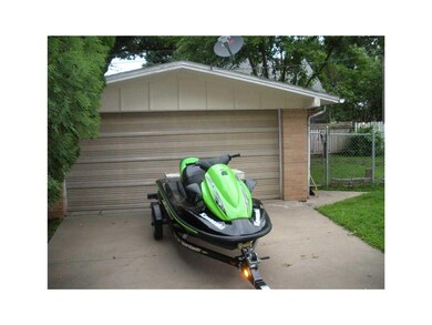 Garage. Two stall behind carport